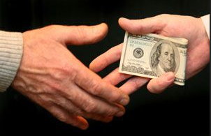 money-hands-bribe